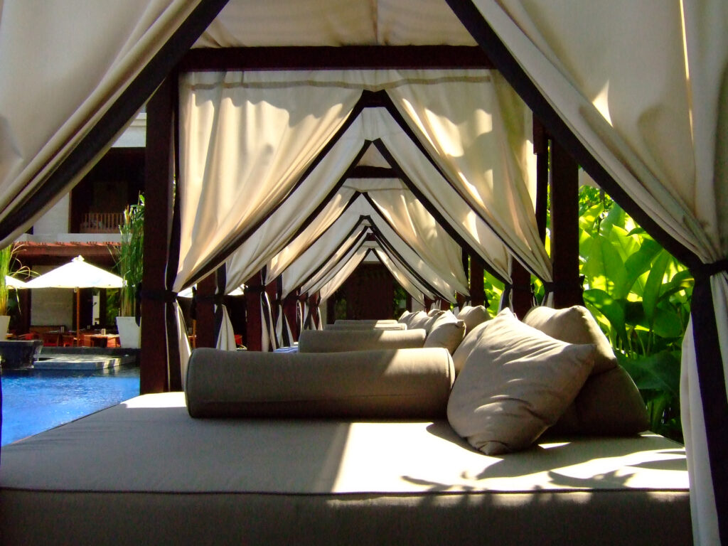 Indonesia poolside canopy bed