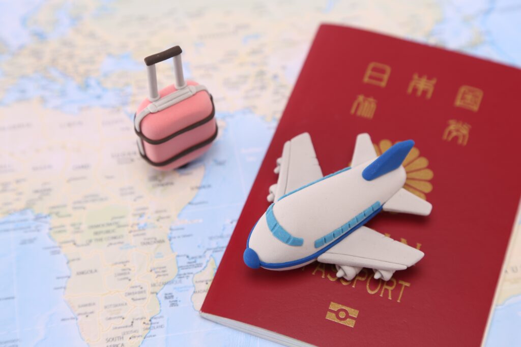 Image of airplane and passport for traveling abroad